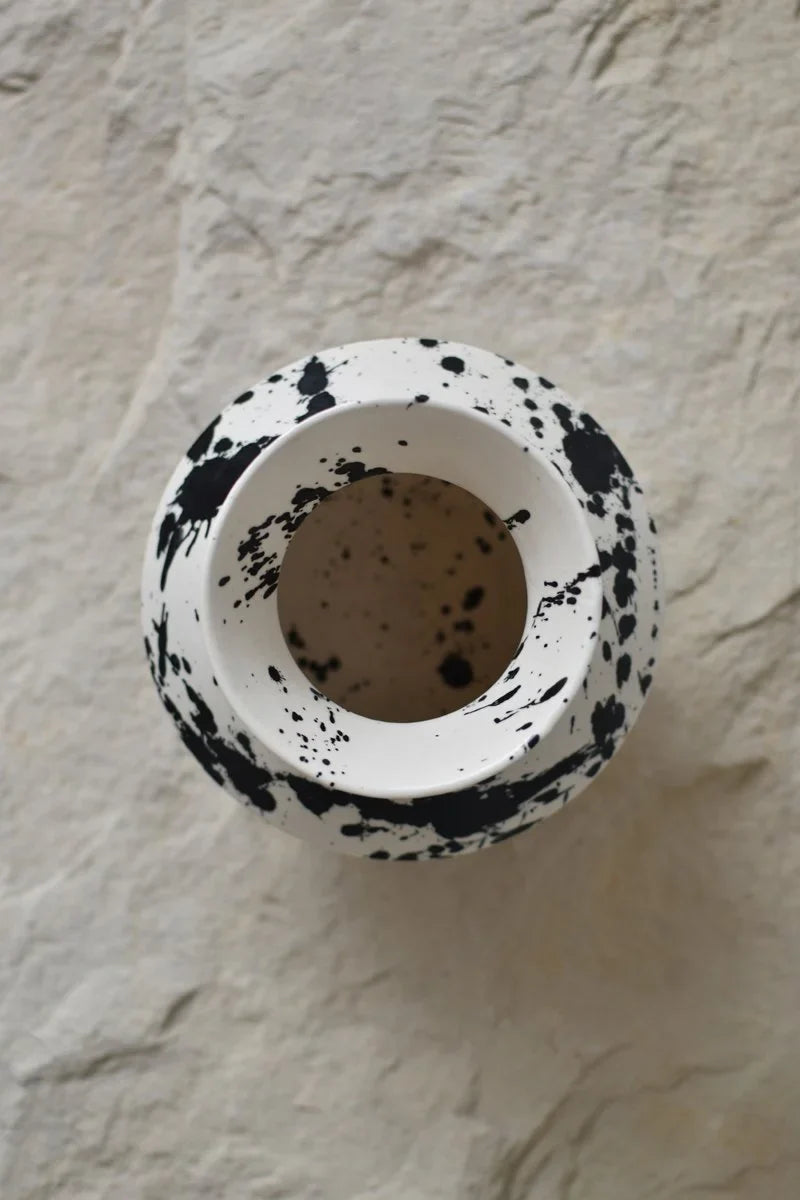 Handmade decorative ceramic vase with hand-painted black splatters