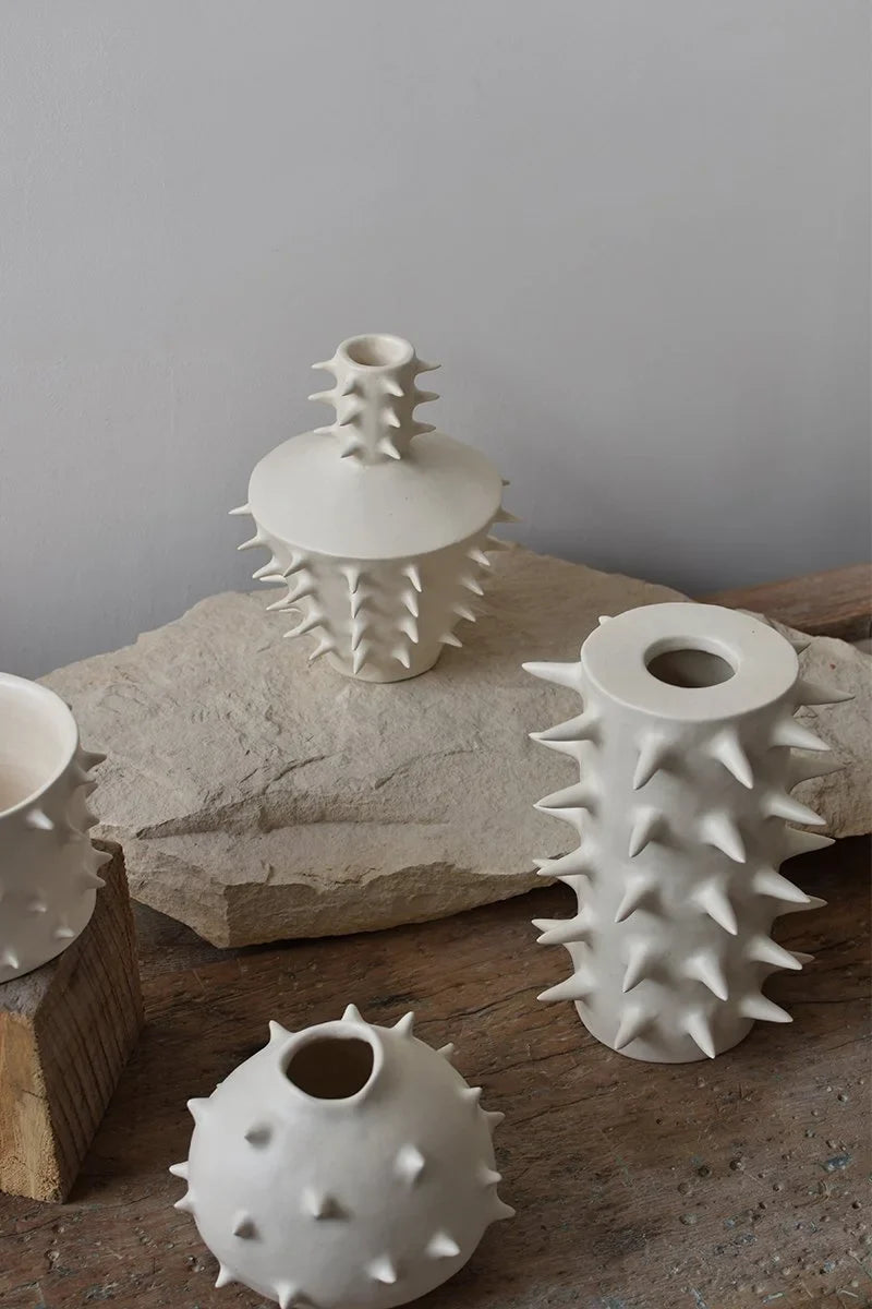 Handmade white ceramic flower vases with spikes by OWO Ceramics