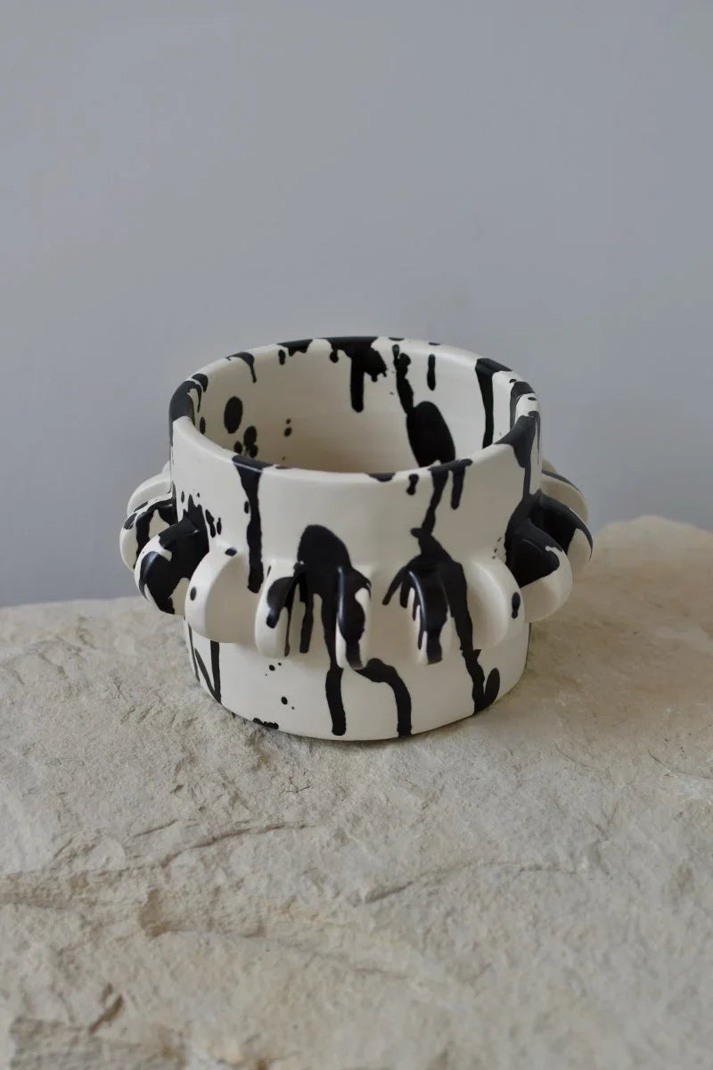 Handmade ceramic planter with hand-painted black splatters by OWO Ceramics